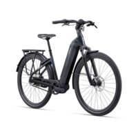 Electric black mid-drive e-bike with front suspension and rear rack, shown at an angle.
