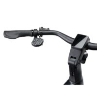 Black bicycle handlebar with a small four-button remote near the left grip and a rectangular smartphone mount on the right side on the stem cap-side mount.