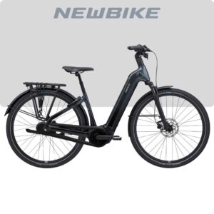 Black electric city bike with a step-through frame, front suspension, disc brake, and rear cargo rack, branded NewBike.