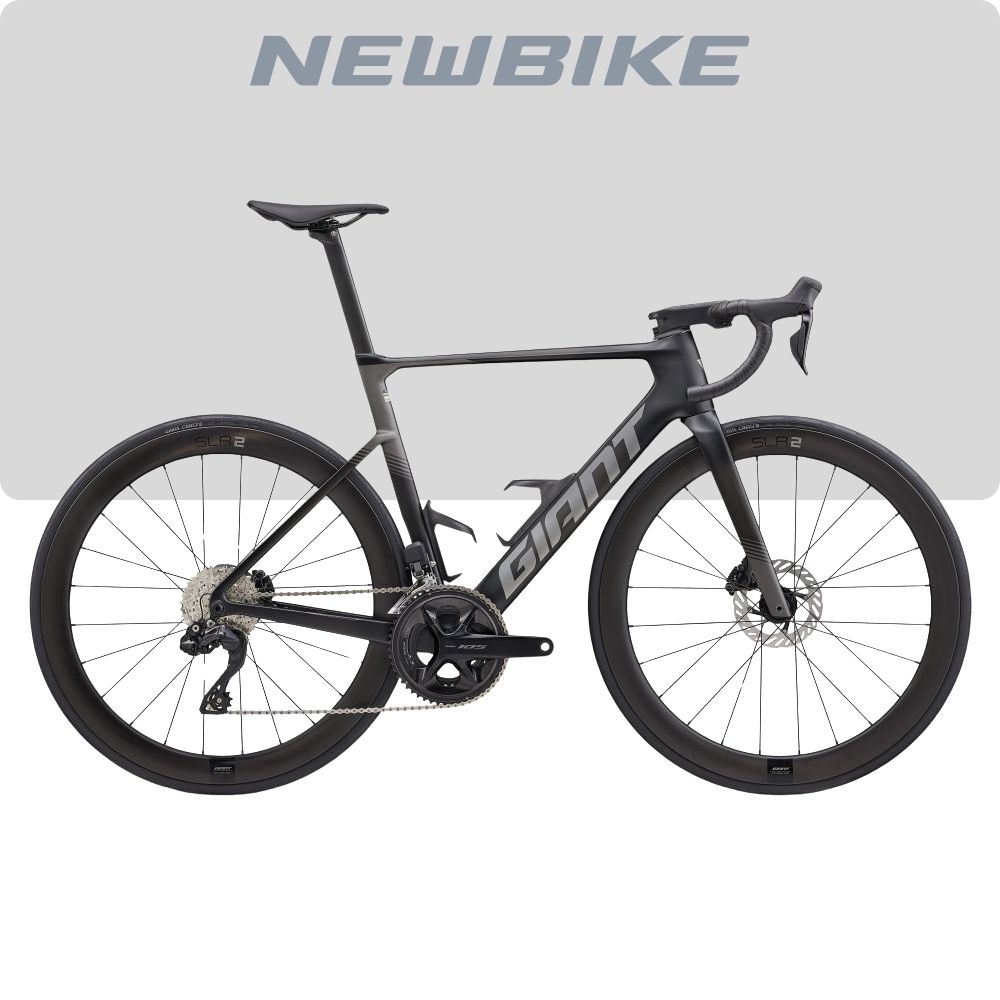 Black Giant road bike shown in profile with carbon frame, aero handlebars, disc brakes, and deep-section wheels against a light grey backdrop with a 'NEWBIKE' banner.