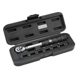 Torque wrench with a set of eight interchangeable bits in a hard black carrying case, showing a calibration scale on the wrench neck.